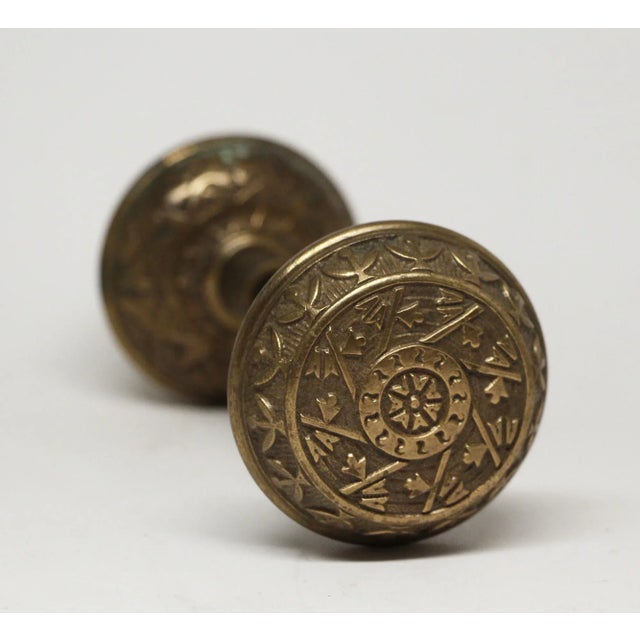 Vernacular style passage bronze door knobs were made by Reading in the 1897 catalog. The Windsor series still sold until...