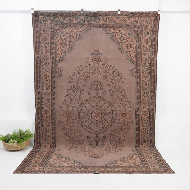 Vintage Turkish Hand-Knotted vintage rug is a semi-antique vintage Area rug.'70s Eastern region of Turkey's unique rug is...