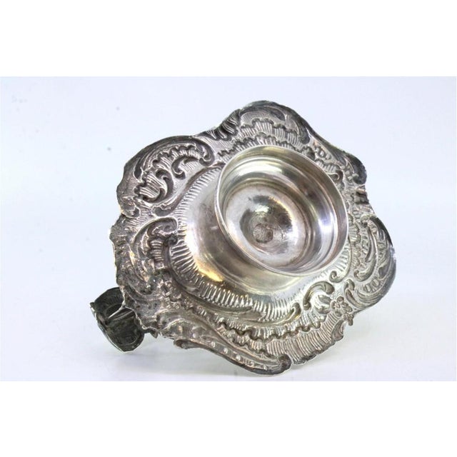 Silver Paddle with Reliefs and Cutouts, in Very Good conditions. Designed 1890 to 1919 This piece has an attribution mark,...