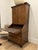 French Louis XV style secrétaire à abattant featuring an elegant bombe-form base, richly figured wood veneers, and...