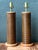 This vintage pair of pencil reed cylinder lamps combines the warmth of natural wood with the quiet gleam of brass in a...