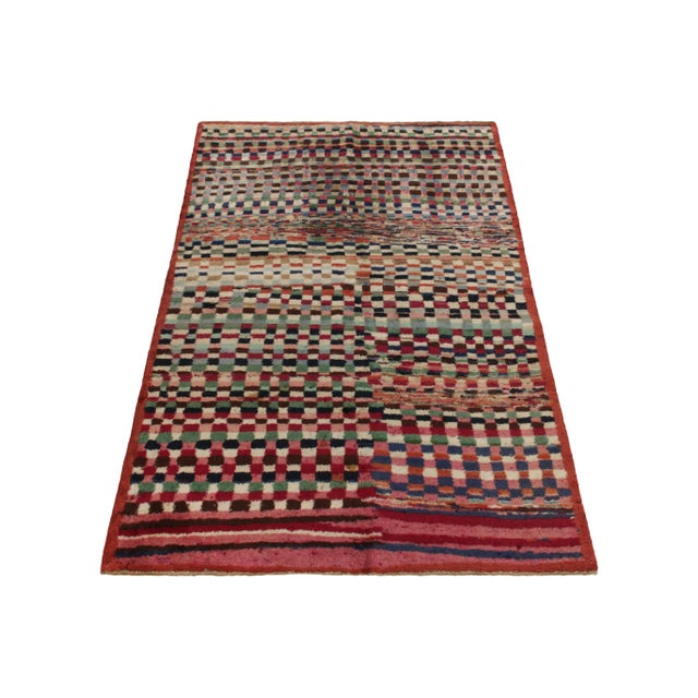 Hand-knotted in wool, a 4x6 vintage rug from a bold Turkish designer, commemorated in Rug & Kilim’s Mid-Century Pasha...