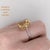 This statement ring features a 7 carat emerald cut citrine with two round natural earth-mined diamond accents in solid 14k...