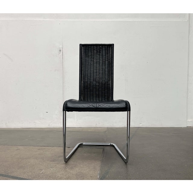 Classic Tecta cantilever chair with matching leather cushion. Classic tubular steel cantilever chair from the renowned...
