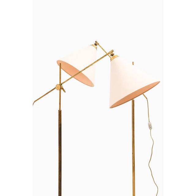 Pair of floor lamps in brass and original shades by t.h. Valentiner, 1960's additional information: material: brass and...