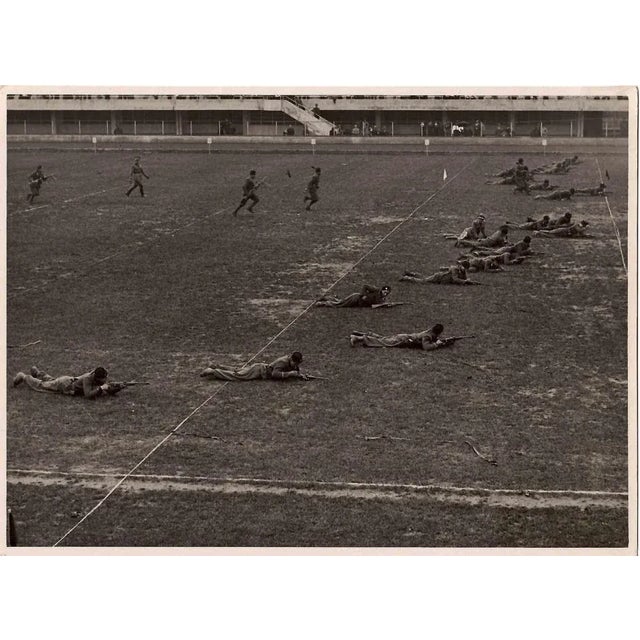 The Martial Show is an original black and white photograph realized by an Anonymous photographer in the 1930s. With the...