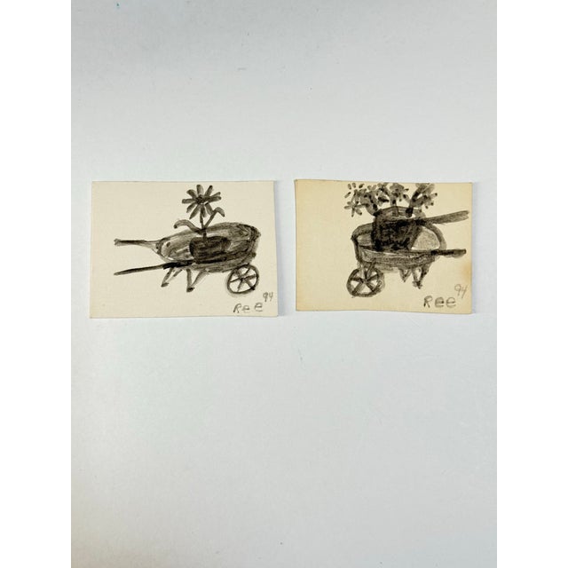 A pair of miniature paintings by Seattle artist Ree Brown. Featuring wheelbarrows with potted flowers, these would be...