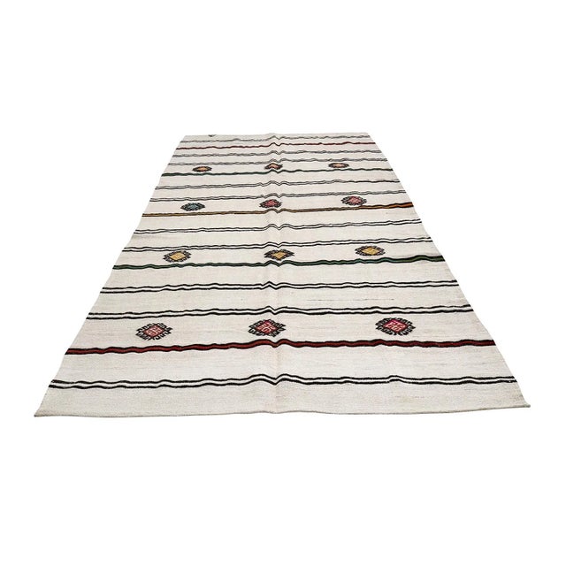 Handwoven vintage hemp kilim rug from Yozgat region of Turkey. Approximately 45-55 years old. In very good condition.