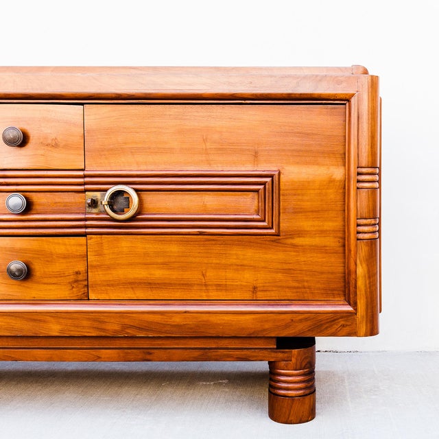 A striking and beautifully restored monumental credenza by modernist designer Charles Dudouyt, made in France c. 1930s....