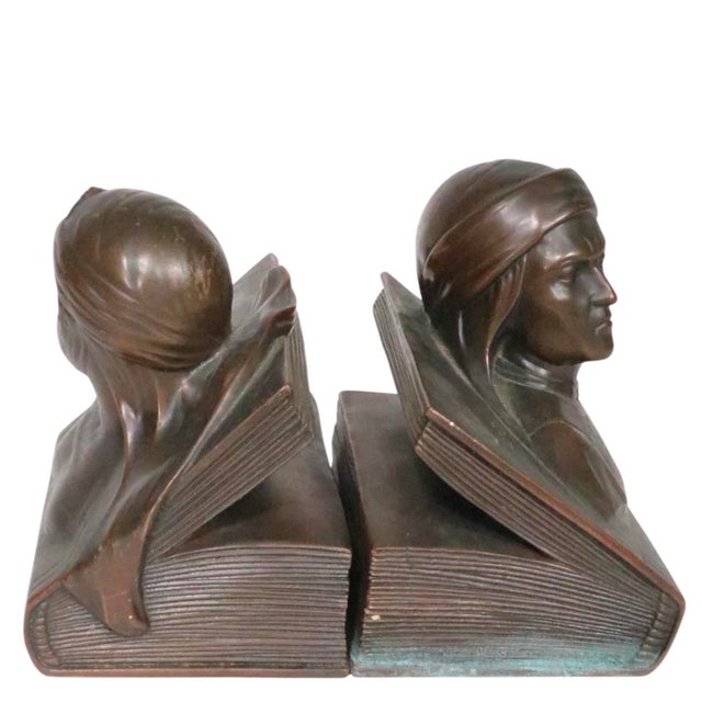 Classic Art Deco bookends depicting Dante and Beatrice, made in the US by Jennings Brothers, circa 1930's. The bookends...
