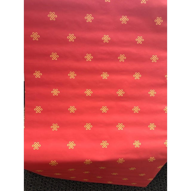 Thibaut wallpaper in a deep red with a gold medallion motif I single roll perfect for an accent wall or bookcase