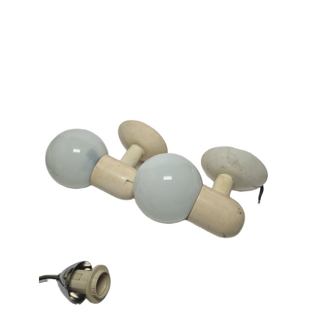 A pair of sconces from the 80s. They are preserved in good condition. European Plug (up to 250V).The wiring of this item...