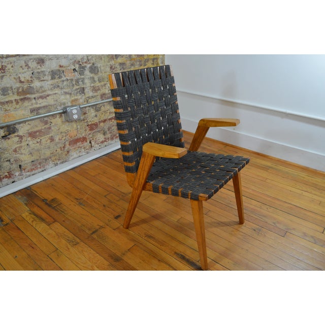 This is a bit of a mystery chair. It was acquired along with a few other Jens Risom pieces and certainly has that look but...