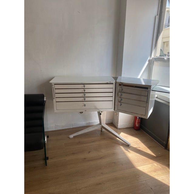 Vintage sliding dentist's cabinet with ample storage. One of the glass shelves is broken. A rare piece designed in the...
