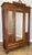 A stunning Antique French oak mirrored wardrobe featuring elegant proportions, beautifully detailed craftsmanship and...