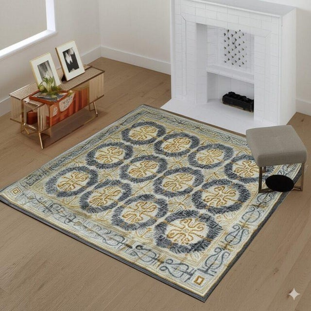 Giselle Exquisite Beige Hand Knotted Wool Rug, Country of Origin: China. This magnificent piece offers a sophisticated...
