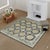 Giselle Exquisite Beige Hand Knotted Wool Rug, Country of Origin: China. This magnificent piece offers a sophisticated...