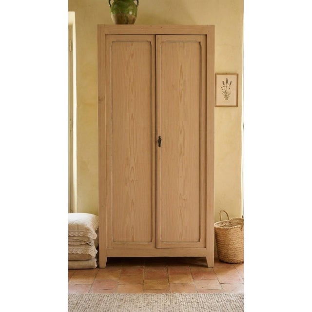 Vintage Parisian Wardrobe in Fir, 1950s, in Very Good conditions. Designed 1950 to 1959 This piece has an attribution...