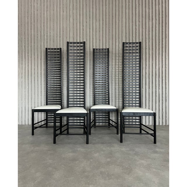 Designer unknown netherlands 1980s h 158cm w 50cm d 50cm a set of four postmodern dining chairs defined by their dramatic...