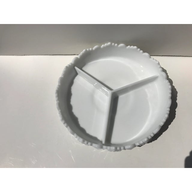 This is a beautiful 3 section divided dish. It could be used as a relish or candy dish. It is footed, has a wonderful...