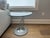 Naos Gemellino round side table, purchased from Cantoni in Dallas. Made in Italy. The design combines a clear glass top...
