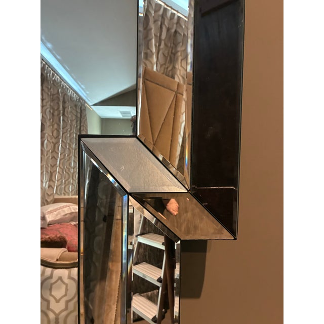 A gorgeous huge mirror that would enhance any grand entry or living room. It is beautifully constructed and framed with...