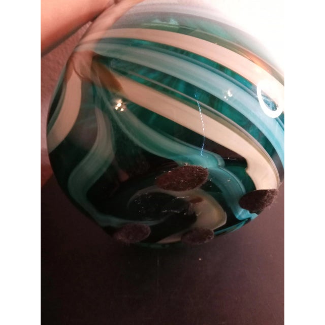 This is a Green Swirl Art Glass 8"x11" Decorative Vase. Procured at auction