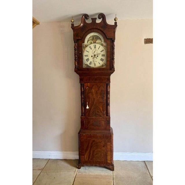 Fine quality antique Regency inlaid mahogany longcase clock, having a fine quality antique Regency longcase clock with a...