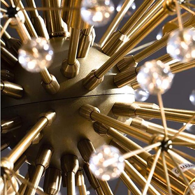 Dandelion Sculptural Chandelier by Remains Lighting (model Dandelion 32) is a striking contemporary statement piece...