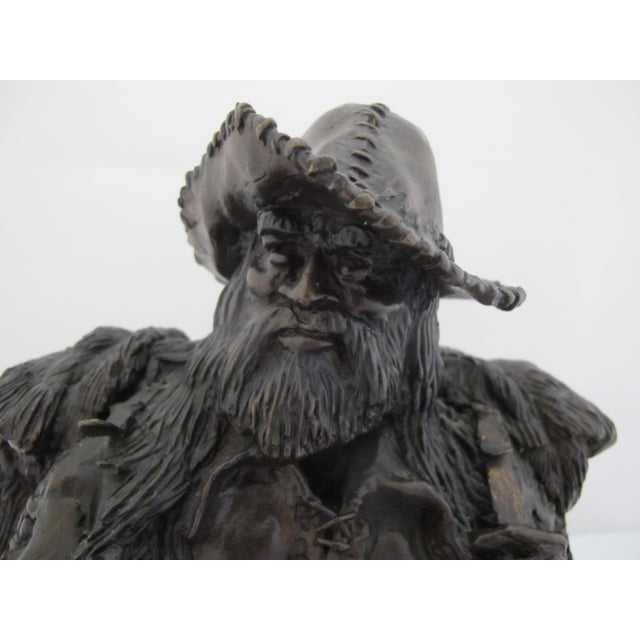 Limited edition original Western bronze sculpture on wood platform "Rocky Mountain Trapper" by Oregon sculptor, Dan Huber....