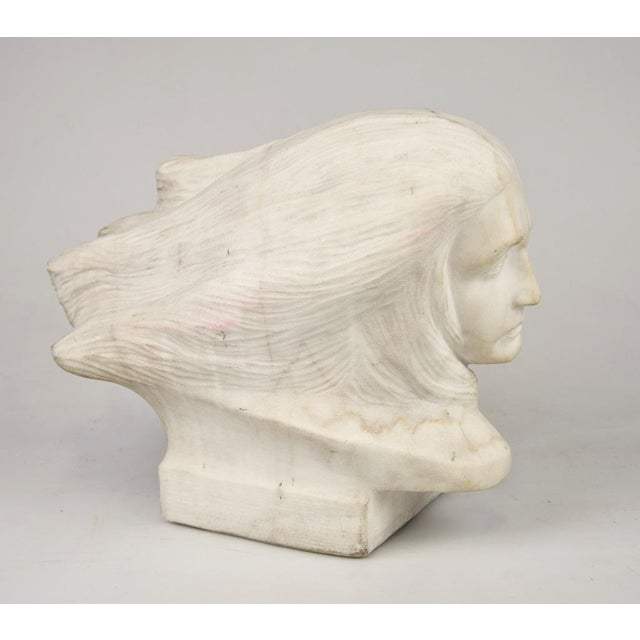 The Wind is an original marble sculpture made by Anonymous artist and realized in the 1920s. A beautiful white marble...