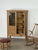 Danish display cabinet in solid oak with leaded glass doors, 1960s. The upper section is enclosed by two glazed doors,...