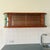 Exuding mid-century elegance, this is a Polish wall-mounted showcase cabinet dating from the early 1960s. It features...