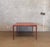 Authentic Danish Modern side table by Kristiansen & Thomassen. Crafted in beautifully figured teak with tapered solid teak...