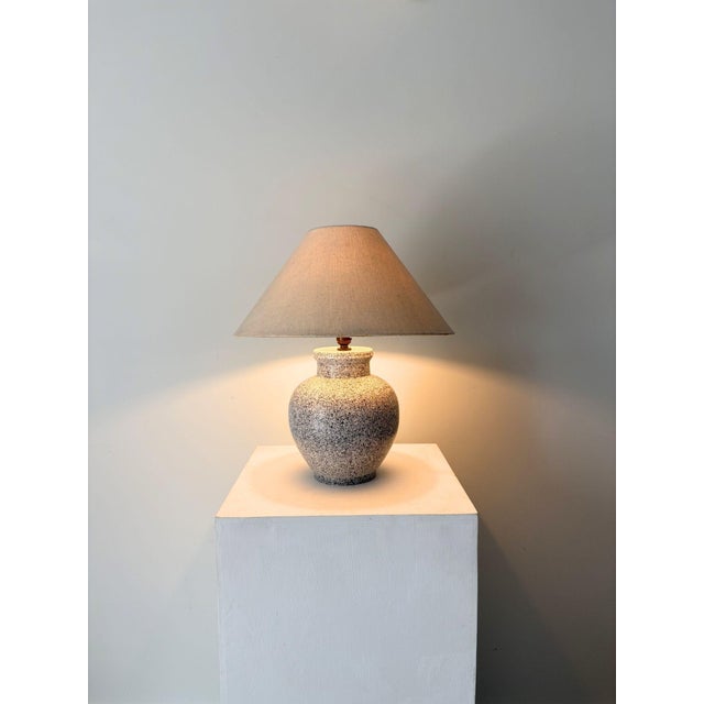 A rare late 20th century italian ceramic lamp in monochrome tones. This vintage table lamp has a smooth black and white...