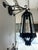 Pair of vintage wall-mounted lantern sconces in a tapered pineapple-inspired form with metal frames and seeded glass...