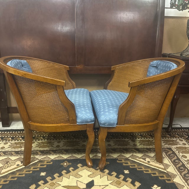 Transform your space with the timeless elegance of these Vintage Hollywood Regency cane back chairs. Perfect for adding a...