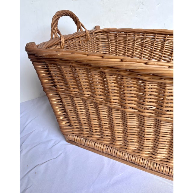 Imported from Germany. Vintage European wicker market basket with interlocked braided edge, wood slat supports, and...