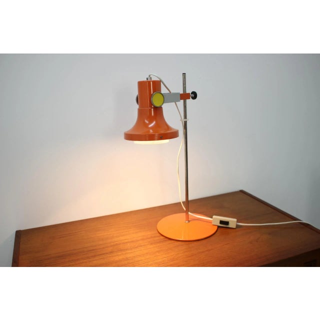 This 1970s Czechoslovakian table lamp is adjustable. European Plug (up to 250V).The wiring of this item may be original...