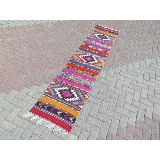This beautiful, traditional vintage, hand knotted Turkish runner is approximately 60 years old. It is handmade of very...