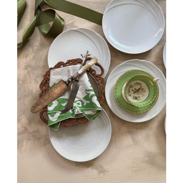 Gorgeous set of six vintage white porcelain plates, these were made in Germany. The pattern is known as Maxim’s de Paris...