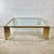 This striking square coffee table translates the visual language of American skyscraper architecture — stepped, ziggurat,...