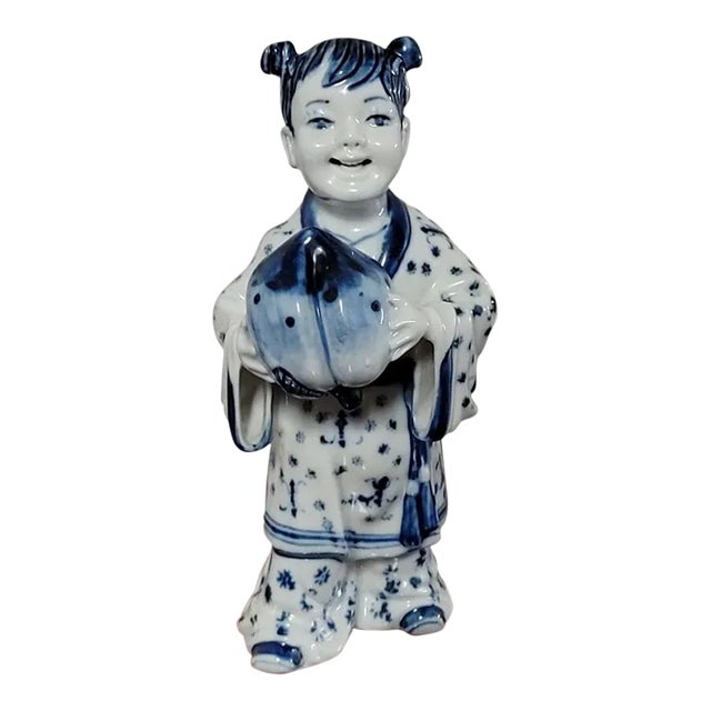 Blue and White Porcelain Chinese Girl Holding Peach Figurine For Sale