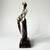 This original House of Erté figurine, titled "Pearls and Emeralds," is a hand-painted fine porcelain collectible produced...