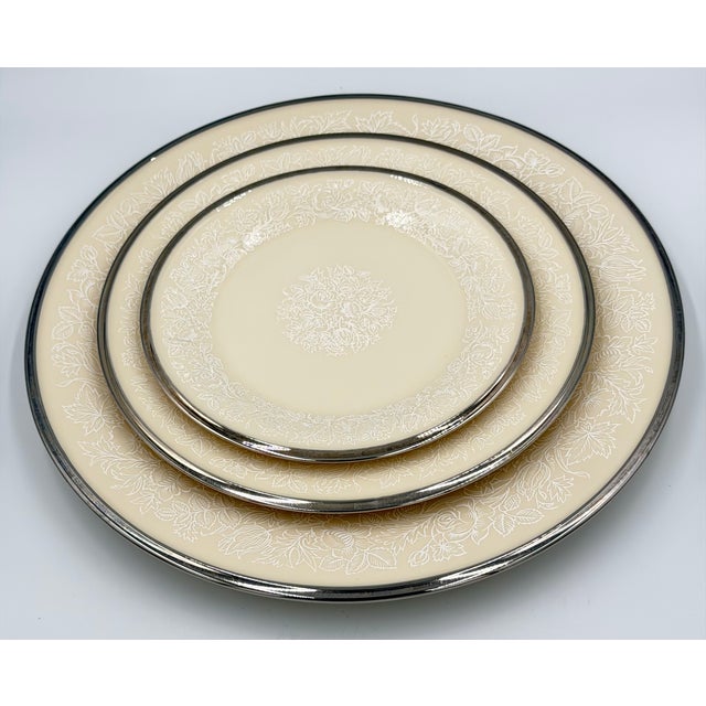 Timeless elegance with this exquisite vintage Lenox Moonspun china 3-piece plate set. Each piece features a delicate...