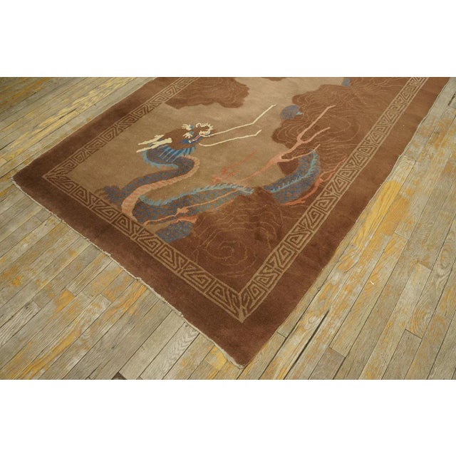 1920s Magnificent Brown Earth Tone Color and Majestic Chinese Dragon Design in Light Blue and Ivory Antique Chinese Peking Rug For Sale - Image 5 of 9