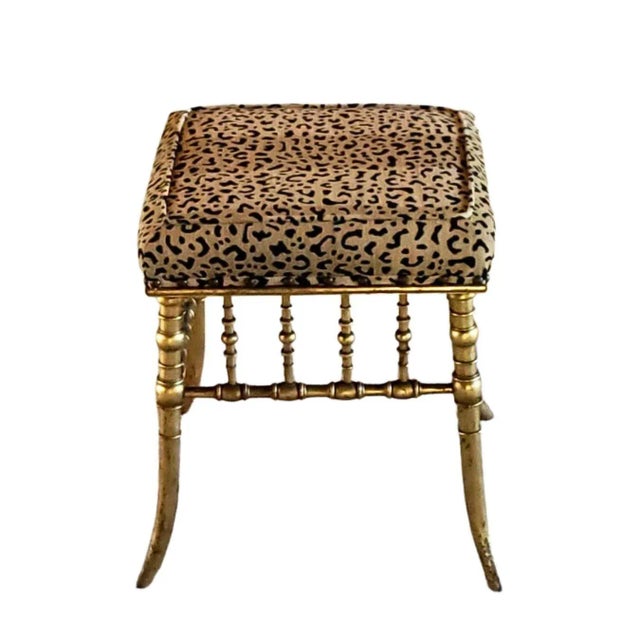 19th Century Bamboo Style Wood Bench with new upholstery in faux leopard fabric.