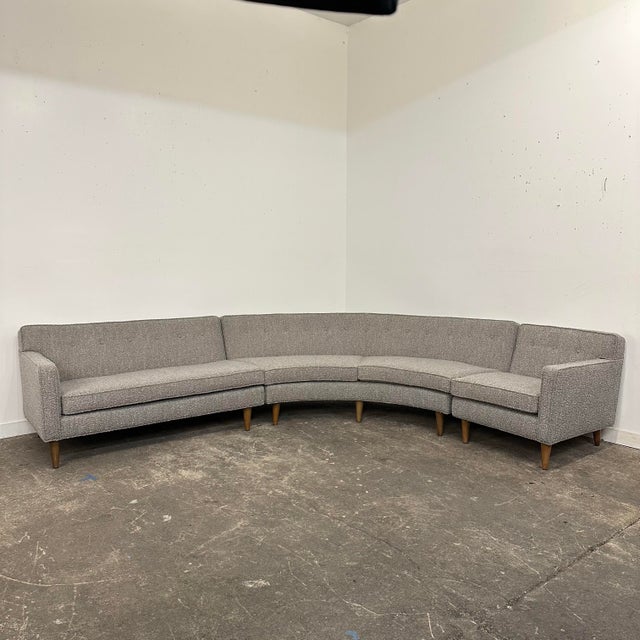 Mid-century modern 6-seat Dunbar sectional reupholstered in a gray textured fabric. Small piece - 27.75” W x 33” D...