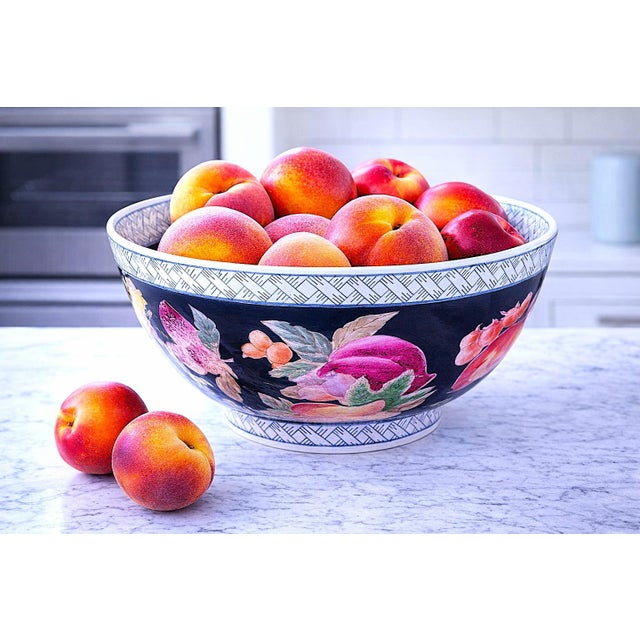 1970s Chinese WBI Hand Painted Bowl. Against a dark blue back drop, vibrant fruit adorn this very pretty bowl. Hand-...