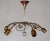 Rare mid-century modern six-armed chandelier or pendant lamp in shape of a swirl. With bulb holders like buds. Designed...